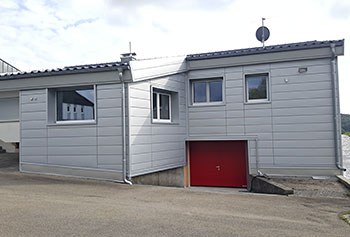 Residential house facade shaped with metal panels from Dangel